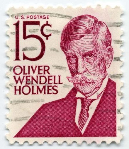 The iconic image of Holmes with his bushy mustache (from a 1970s postage stamp) that most Americans know today.