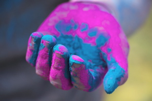 Hand with colored powder