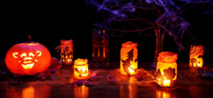 Lit-up lanterns with designs, pumpkin, Halloween themes