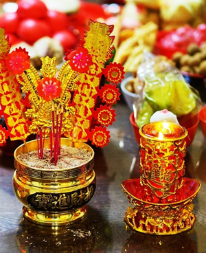 Foods and decor of red and gold on table