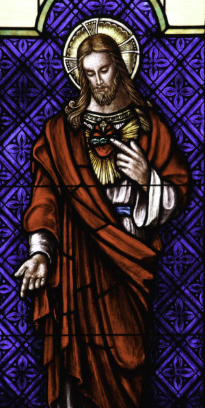 Stained glass image of Jesus Christ with Sacred Heart