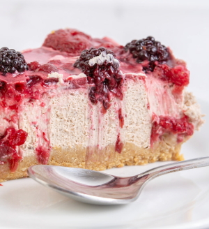 Berry cheesecake slice with spoon