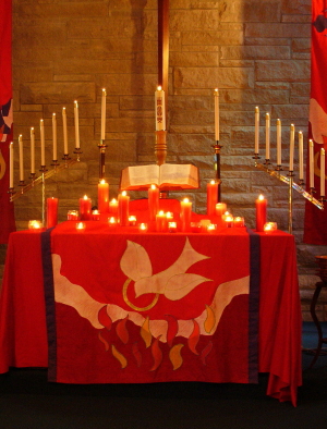 Pentecost candles, drapery, altar