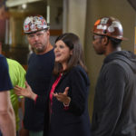 Haley Stevens jokes around with steelworkers.